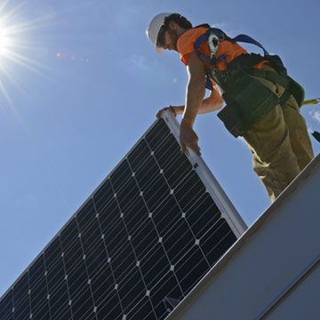 Construction worker working on Skipwith Hall solar array